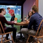 people playing simulator golf at Play-a-Round Golf Golf party